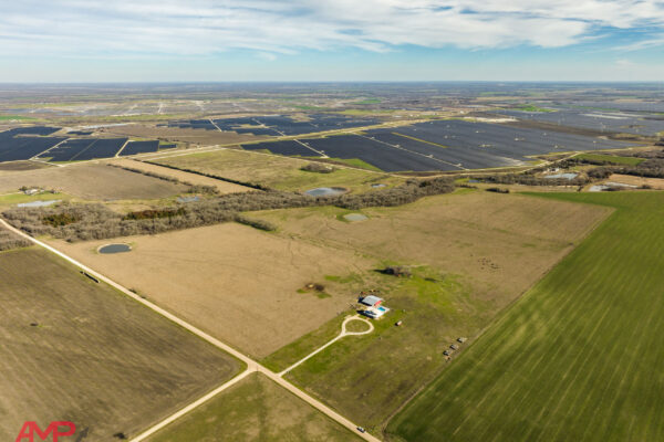 Aerial image of farm to convey benefits of Farm Credit Lending in Texas - Ekdahl  Real Estate