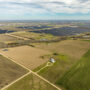 Aerial image of farm to convey benefits of Farm Credit Lending in Texas - Ekdahl  Real Estate